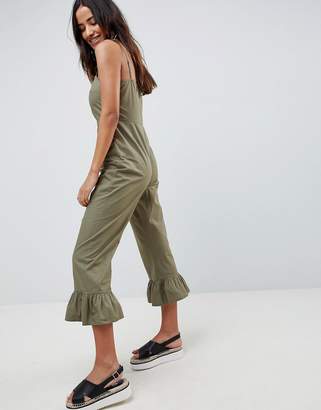 ASOS DESIGN cotton frill hem jumpsuit with square neck and button detail