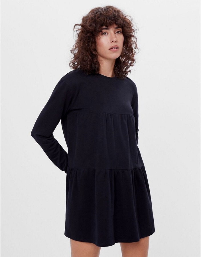 Bershka long sleeve tiered T-shirt smock dress in black - ShopStyle