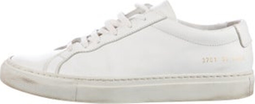 Woman by Common Projects Leather Low Top Sneakers White Round-Toes Lace-Up Closure at Uppers Includes Box & Dust Bag Unfortunately, due to restrictions, this item may not be eligible for shipping in all areas.