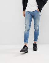 Thumbnail for your product : Love Moschino Skinny Fit Jeans In Midwash Blue With Distressing