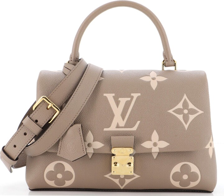 Sold at Auction: Louis Vuitton Giant Monogram Empreinte Madeleine MM Top  Handle Bag