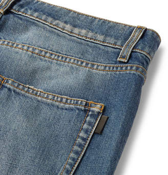 Saint Laurent Skinny-Fit 15cm Hem Distressed Denim Jeans - Men - Indigo