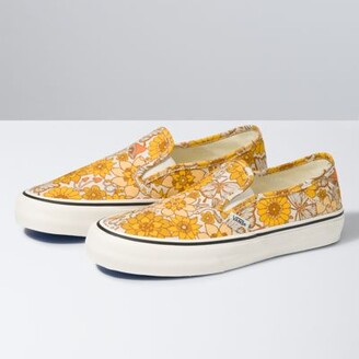vans with yellow flowers