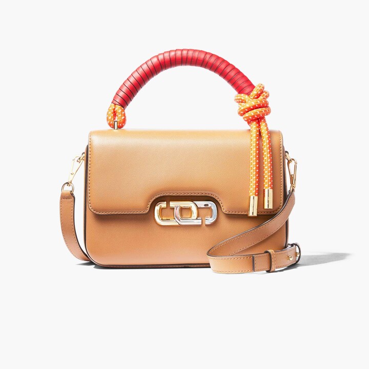 small nomad crossbody bolsa