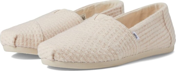 Toms Slip On Flats to wear on a beach 