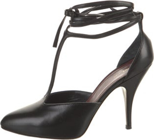 Celine Leather T-Strap Pumps Black Round-Toes Wrap-Around Straps & Tie Closures Unfortunately due to restrictions this item may not be eligible for shipping in all areas.