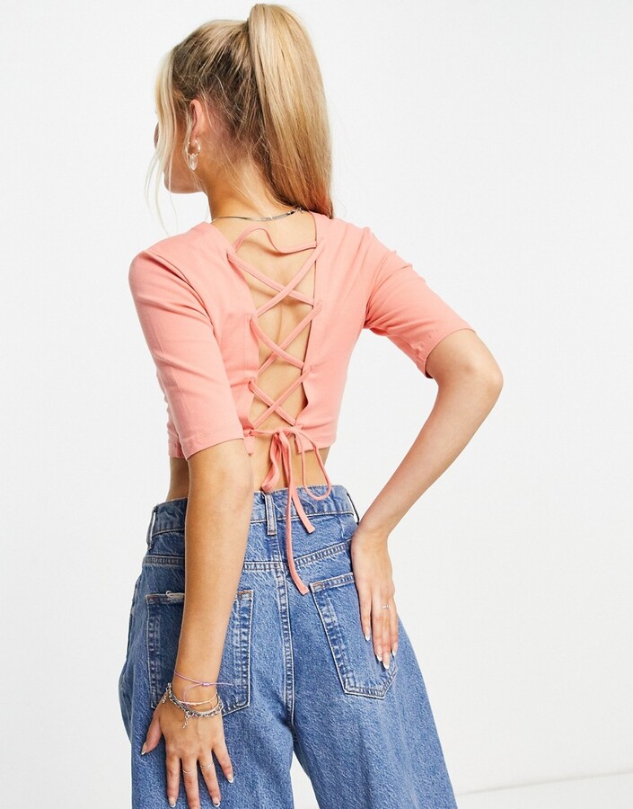 Only cropped jersey top with cut out lace up back in coral - ShopStyle