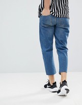 Thumbnail for your product : Mennace Tapered Jeans In Midwash Blue With Knee Rip