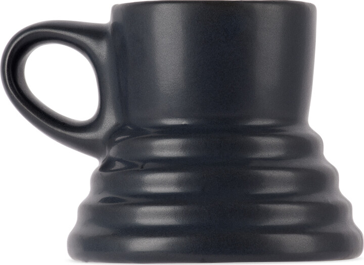 https://img.shopstyle-cdn.com/sim/b7/fe/b7fea1423d1e855a178ceb0aadcfff37_best/bklyn-clay-ssense-exclusive-black-no-spill-mug.jpg
