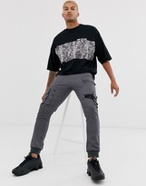 Thumbnail for your product : ASOS DESIGN organic cotton oversized t-shirt with animal colour block block and contrast pocket