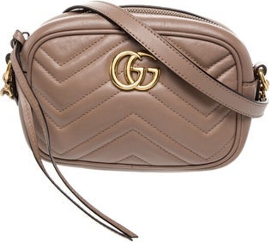 Gucci Crossbody Bag Neutrals Leather Double G Logo Gold-Tone Hardware Chain-Link Shoulder Strap Chain-Link Accents Suede Lining & Single Interior Pocket Zip Closure at Top Includes Dust Bag Unfortunately, due to restrictions, this item may not be eligible for shipping in all areas.