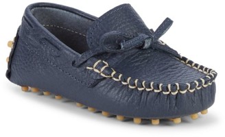 boys driving moccasins