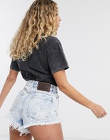 Thumbnail for your product : Reclaimed Vintage inspired denim short with raw hem and distressing in blue acid wash