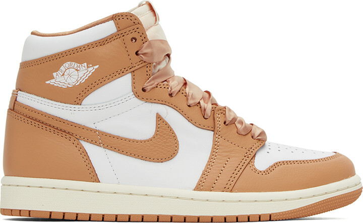 tan and green jordans