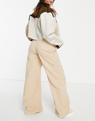 Bershka Petite wide leg cord trouser in ecru - ShopStyle