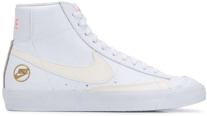 white leather nike high tops