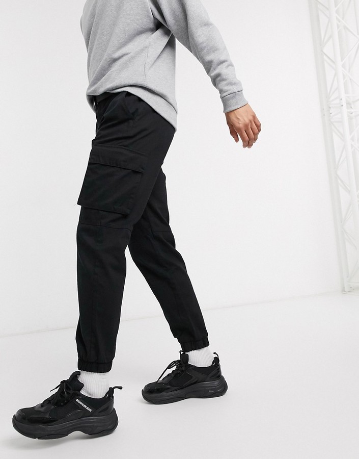 Bershka cargo sweatpants with belt in black - ShopStyle Activewear Pants
