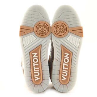 Louis Vuitton Men's LV Trainer Sneakers Monogram Embossed Metallic Leather Silver