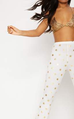 PrettyLittleThing White Jersey Star Print Flared Trouser
