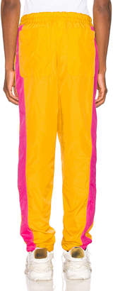 Comme des Garcons SHIRT Mesh Pants in Yellow & Pink | FWRD