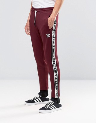 adidas Taping Joggers In Red AY8266