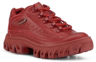 red dot tennis shoes