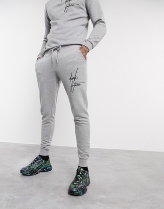 ASOS DESIGN x Dark Future tracksuit with half zip sweatshirt and skinny joggers