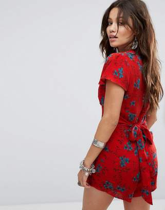 Honey Punch Romper With Plunge Neck In Bold Floral