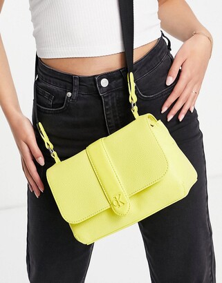 Calvin Klein Yellow Handbags | Shop the world's largest of fashion | ShopStyle
