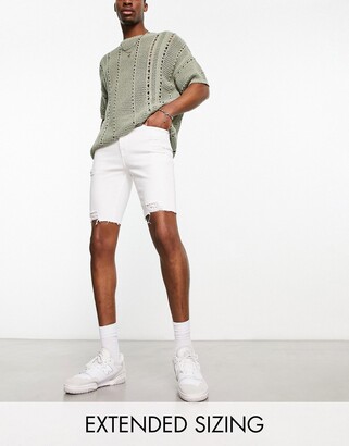 ASOS DESIGN skinny regular length denim shorts in white with rips