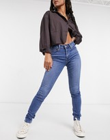 Thumbnail for your product : Levi's 711 skinny jeans in mid wash blue