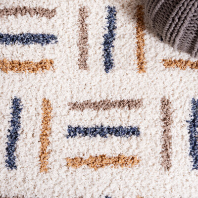 Ebern Designs Calico Shag Performance Geometric Rug