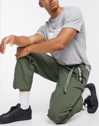 adidas adventure sweatpants in green - ShopStyle Activewear Pants