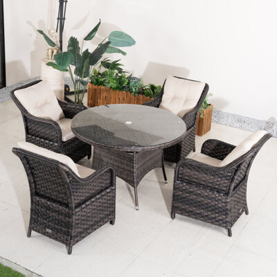 Red Barrel Studio 4 - Person Wicker Patio Dining Set With Round Table  Cushions Included