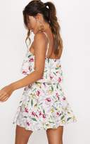 Thumbnail for your product : PrettyLittleThing Cream Floral Print Strappy Layered Skater Dress