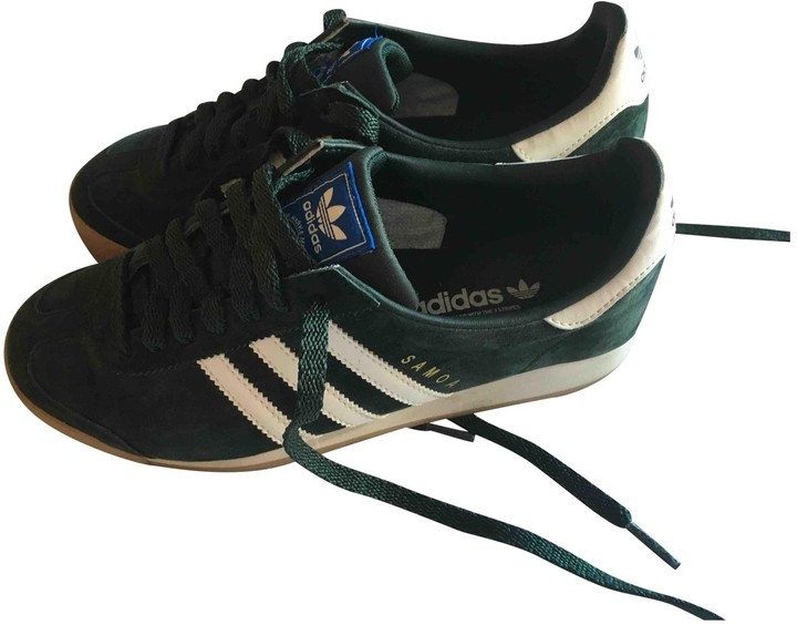 green suede adidas trainers