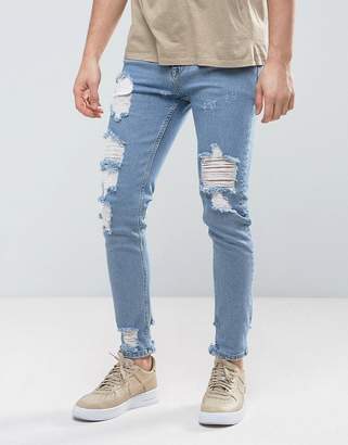 ASOS Skinny Jeans In Light Wash Blue Vintage With Heavy Rips and Repair