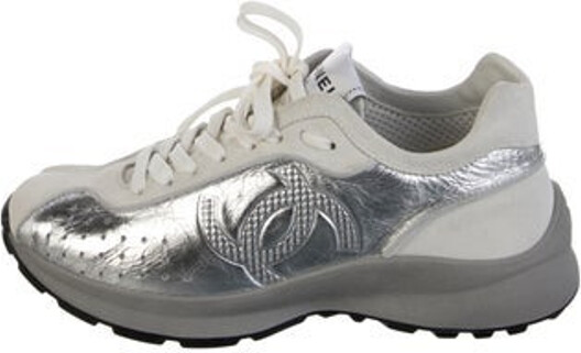 Chanel Leather Low Top Athletic Sneakers From the Cruise 2025 Collection by Virginie Viard Silver Interlocking CC Logo & Quilted Pattern Rubber & Suede Trim Round-Toes Lace-Up Closure at Uppers Includes Dust Bag Designer