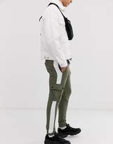 Thumbnail for your product : ASOS Design DESIGN skinny joggers with cargo pockets and side stripes in khaki