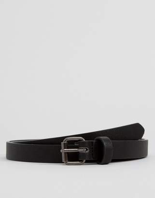 ASOS DESIGN faux leather super skinny belt in black