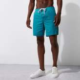Thumbnail for your product : River Island Mens Blue acid wash swim shorts