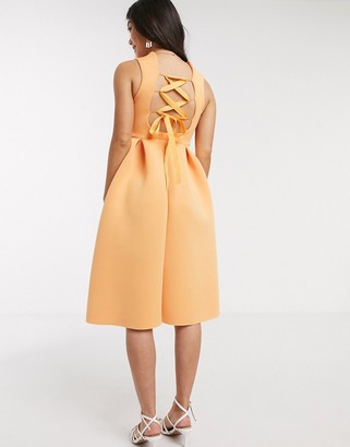 ASOS Petite DESIGN Petite high neck sleeveless midi prom dress with lace up back in washed tangerine
