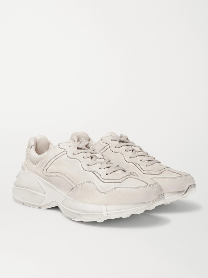 gucci rhyton distressed leather sneakers
