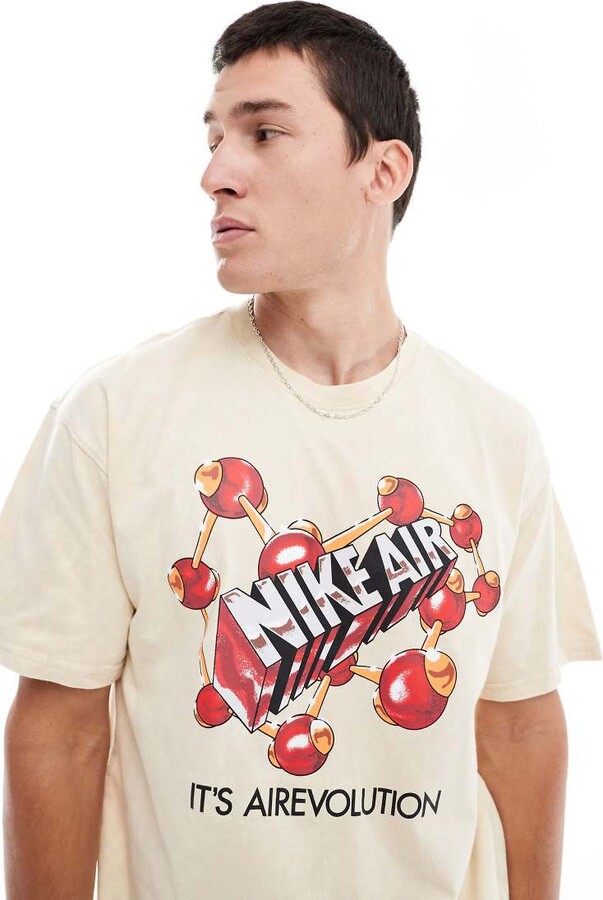 tan nike t shirt