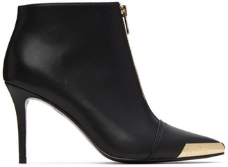 black boots with gold hardware