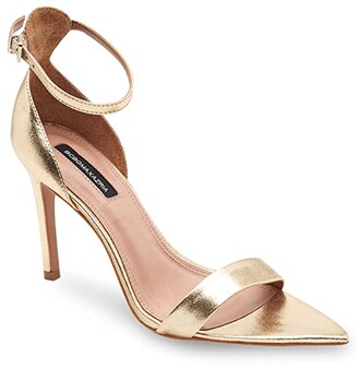 black dress with rose gold heels