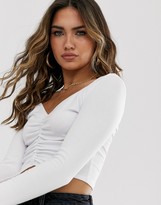 Thumbnail for your product : ASOS DESIGN top with v-front and back and ruched detail in white