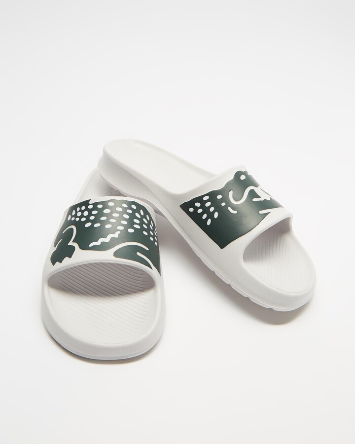 iconic lacoste slides