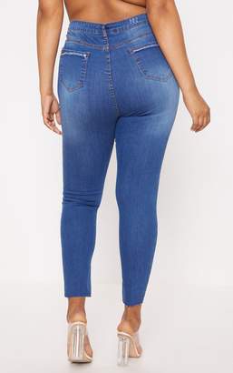 PrettyLittleThing Plus Dark Blue Ripped Detail Step Hem Skinny Jeans