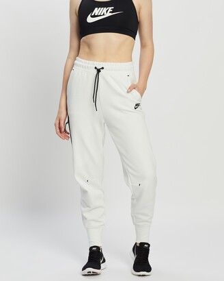white nike tech pants